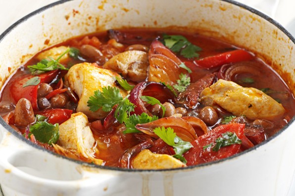 Chicken and Chorizo Stew Recipe Smoky chicken and bean stew in a white cooking pot