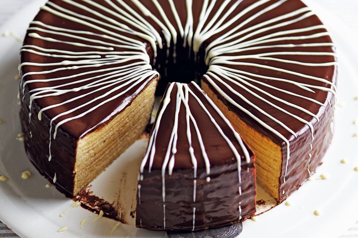 Spiced Rum Bamkuchen Cake Recipe Spiced Rum Bamkuchen Cake Recipe - layered german christmas cake covered in chocolate glaze and white chocolate lines