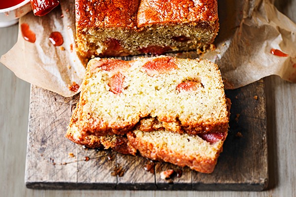 Plum Loaf Cake Recipe Plum loaf cake, sliced on a board