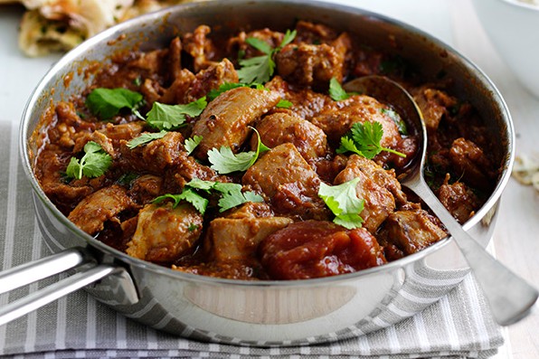 Chicken Madras Curry Recipe Pan of chicken madras topped with coriander