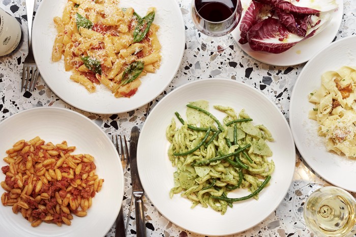 Pastaio, London: Restaurant Review A marble table with lots of places of pasta on top
