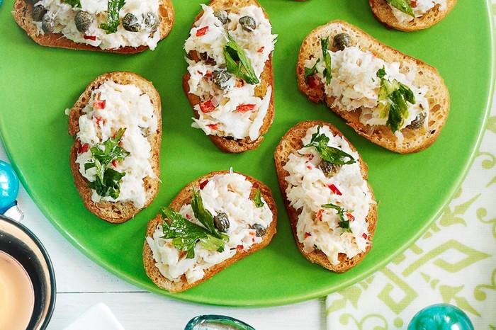 Crab crostini Crab crostini on a green plate