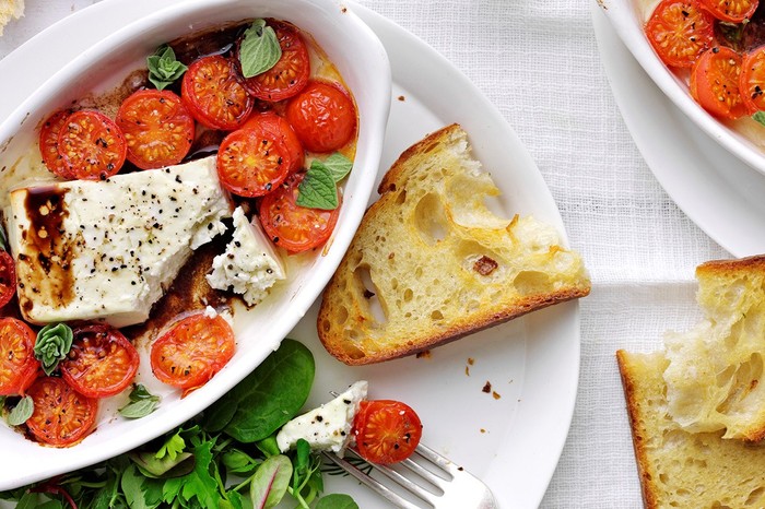 Baked Feta Recipe With Cherry Tomatoes And Garlic Toast Baked feta with cherry tomatoes and garlic toast