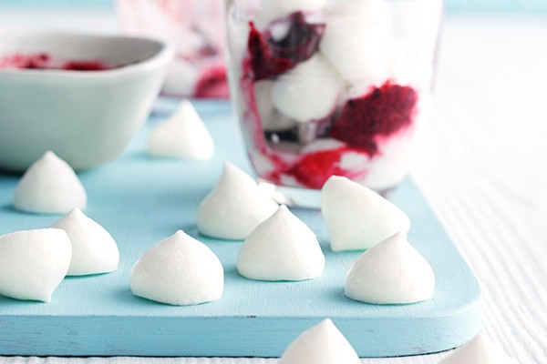 Vegan Meringue Recipe For Aquafaba Meringues Vegan meringues on a surface and in a dessert