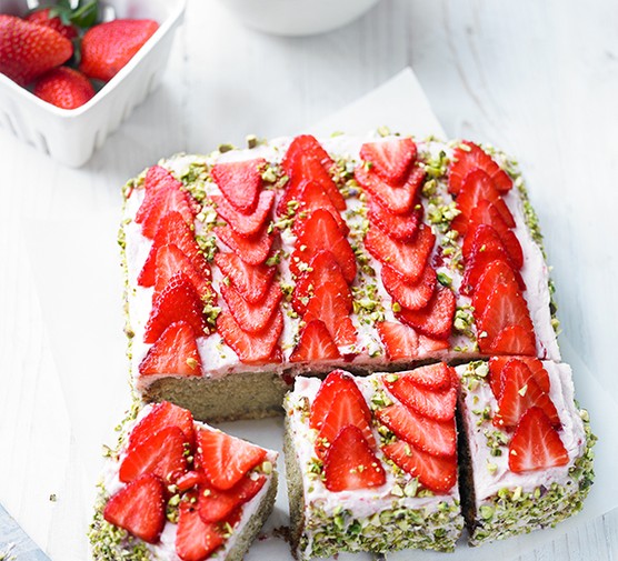29 strawberry recipes Traybake sponge topped with strawberries and pistachios