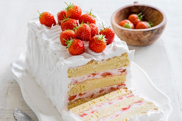 Strawberry Cake Recipe Strawberry layer cake with merigue icing, topped with strawberries