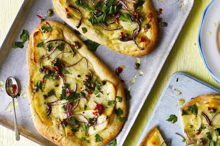 Halloumi pizzettes with caper and chilli dressing Halloumi Pizzettes Recipe with Caper Dressing