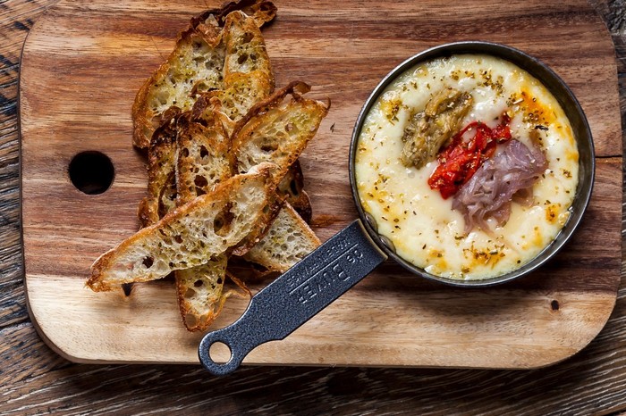 Baked tetilla cheese with escalivada Baked tetilla cheese with escalivada