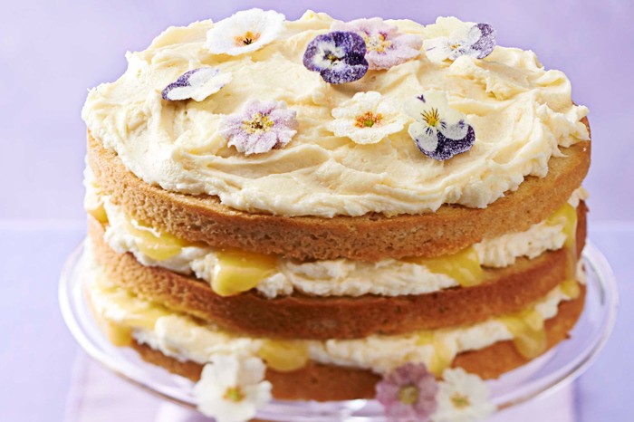 Lemon curd layer cake Lemon curd layer cake decorated with edible flowers