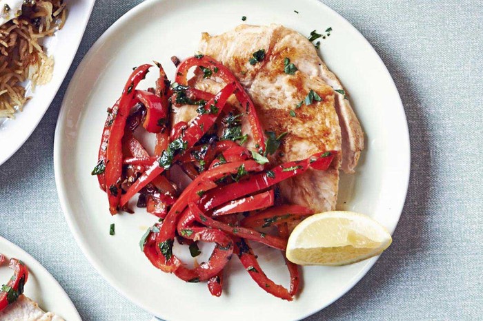 Chicken paillard Chicken paillard escalope, topped with red peppers