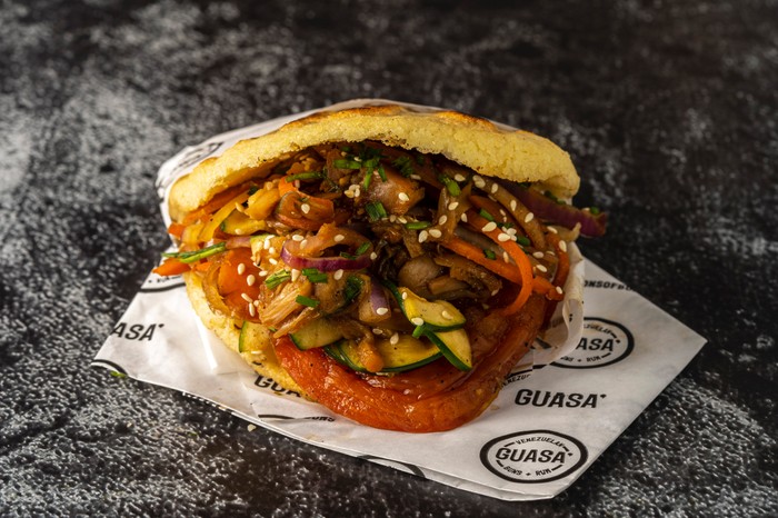 Guasa Arepa filled with jackfruit and salad