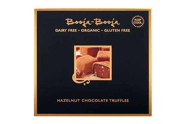Booja Booja Dairy Free Hazelnut Crunch Chocolate Truffles A black box with a gold rim with chocolate truffle photo on the front