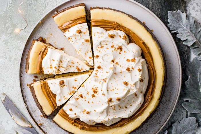 Best Biscoff recipes Speculoos cheesecake cut into slices on a grey plate