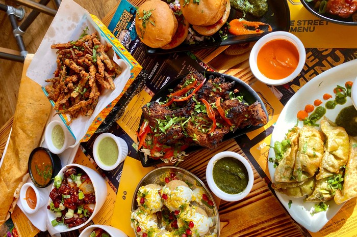 Chit and Chaat A selection of Indian inspired street food including puri and burgers