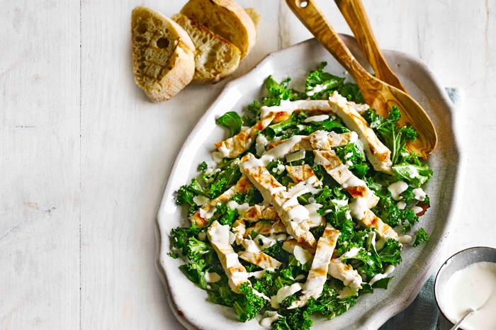 Kale Chicken Caesar Salad Recipe Kale Chicken Caesar Salad with strips of cooked chicken