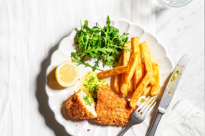 Chicken kiev recipe Chicken kiev with chips and greens