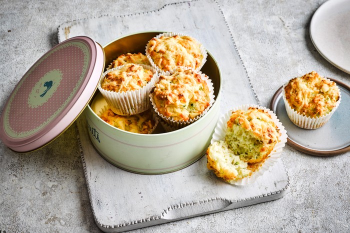 Courgette muffins A batch of courgette muffins in a tin