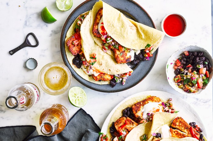 Vegetarian Tacos With Halloumi and Pico De Gallo A plate of vegetarian tacos With halloumi and pico de gallo
