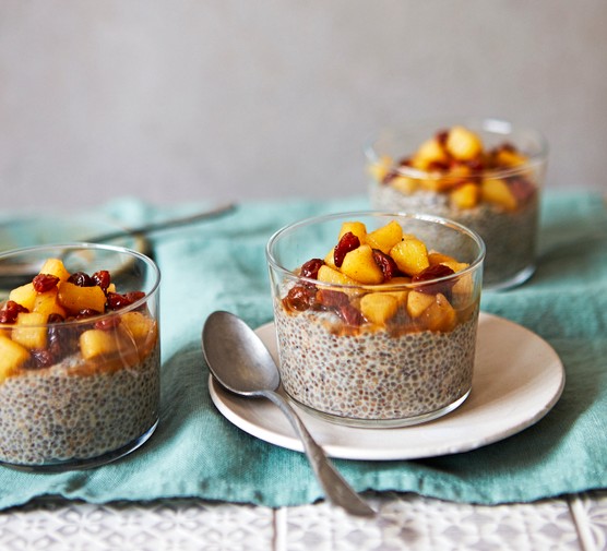 Healthy Chia Pudding Cups of Chia Pudding Topped with Apple Chunks and Raisins