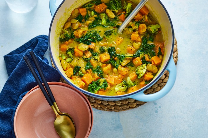 One-pot winter warmer A hearty one-pot in a yellow broth with vegetables and spinach