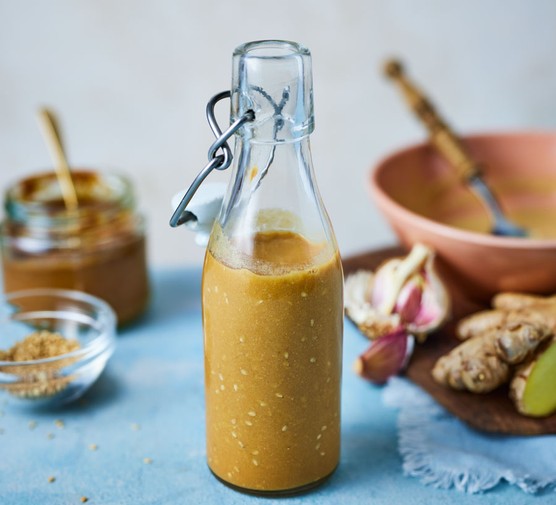 Glass bottle of miso salad dressing