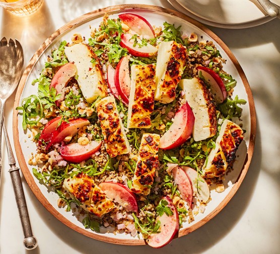 Nectarine and chilli maple halloumi quinoa salad A grilled halloumi salad with nectarines in a large sharing bowl