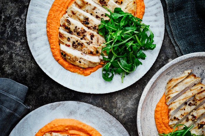 27 healthy chicken breast recipes Chicken and hummus on a plate