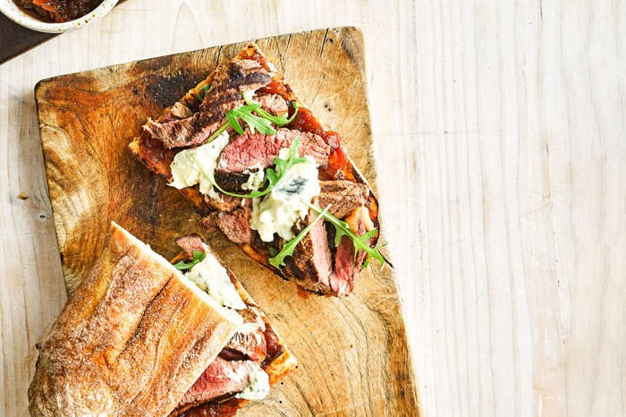 Marmite-glazed steak sandwich A steak ciabatta sandwich on a wooden board