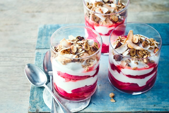 14 high-protein breakfast recipes to try Rhubarb breakfast pots with granola topping served on a tray