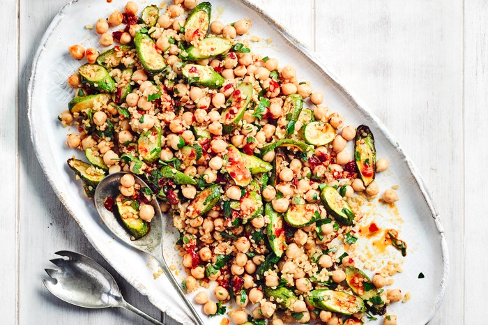 Healthy summer recipes Roasted Courgette Salad with Chickpeas on a White Plate