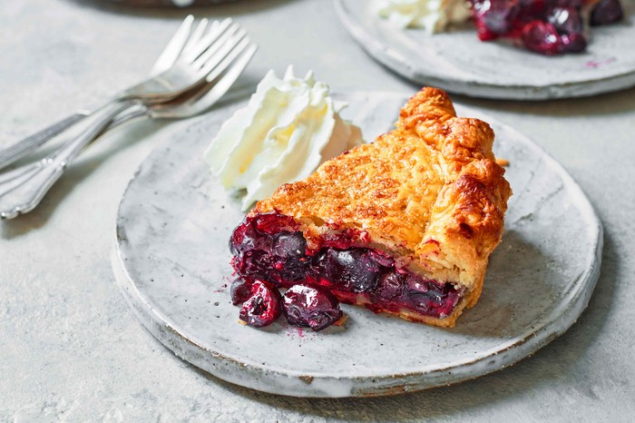 29 cherry recipes Slice of cherry pie on a plate