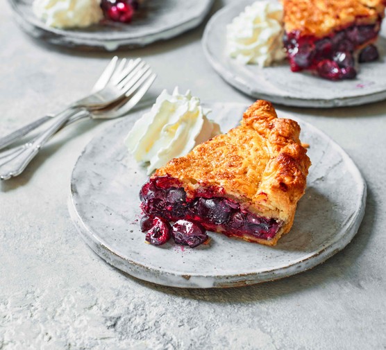29 cherry recipes Slice of cherry pie on a plate