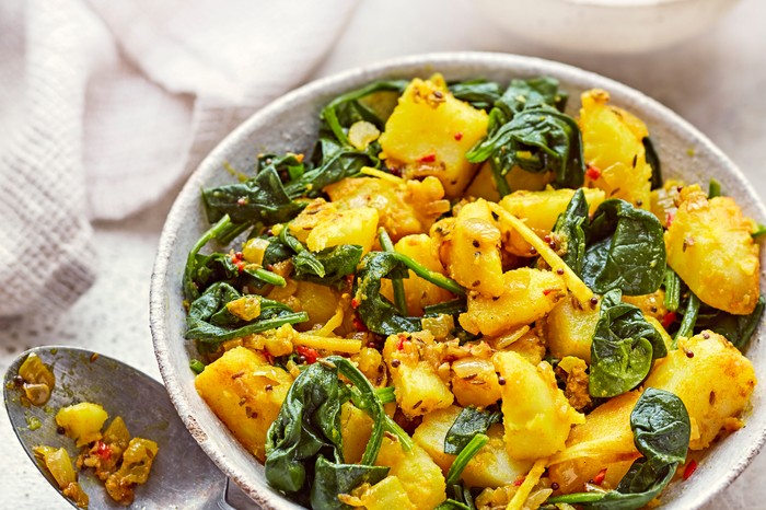 40 Dairy-Free Recipes Saag Aloo in a Serving Bowl