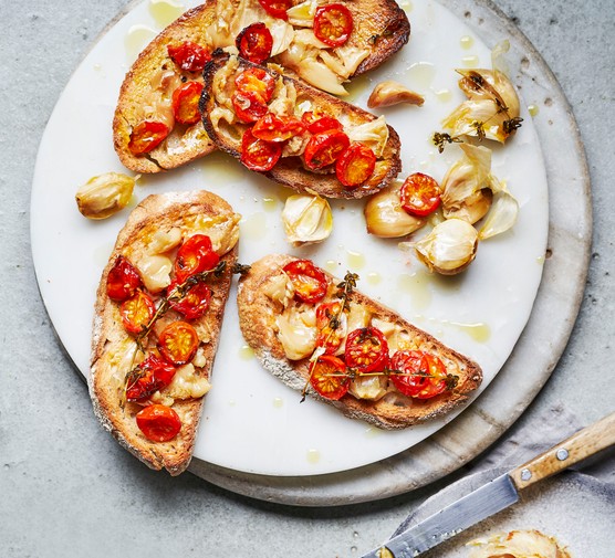 Roasted Cherry Tomatoes on Toast with Garlic Confit Roasted Cherry Tomatoes on Toast with Garlic Confit