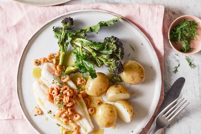 Lemon sole with brown shrimp butter A plate of sole topped with shrimp