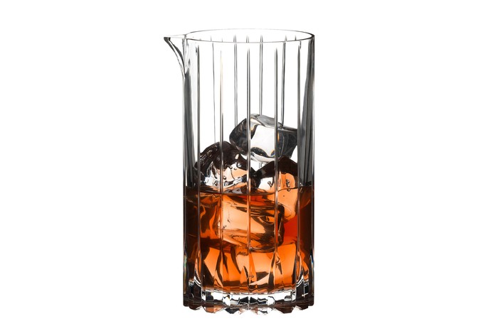 Riedel mixing glass Mixing glass filled with ice and liquid