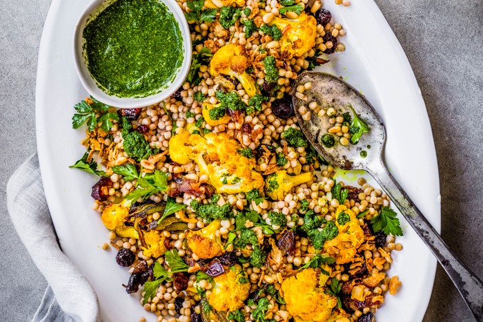 Best Healthy Picnic Food Cauliflower Couscous Salad Recipe with Zhoug Dressing on a White Platter