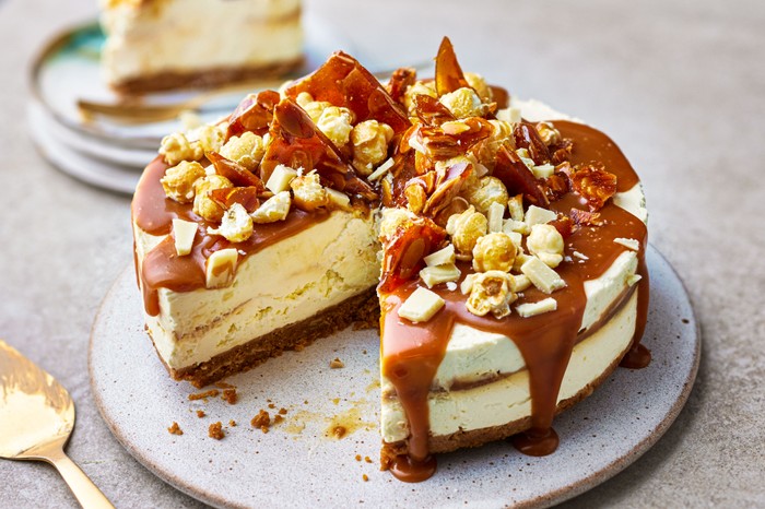 Salted caramel cheesecake A salted caramel cheesecake with a slice cut out