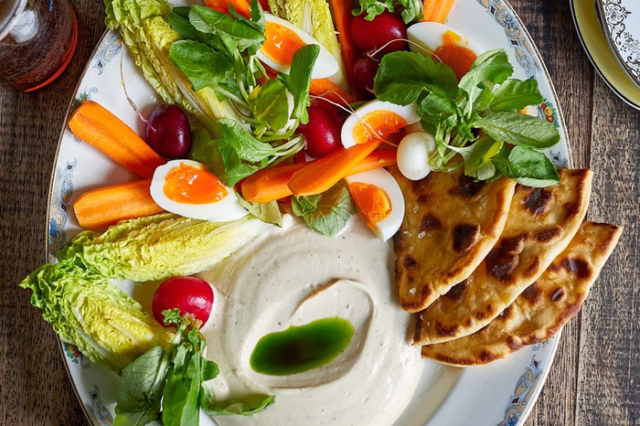 Smoked-cod's-roe-dip-with-spring-vegetables,-soft-boiled-eggs-and-flatbreads Smoked cod's roe dip on a plate with vegetables, boiled eggs and flatbreads