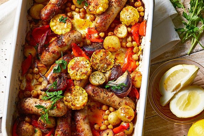 Spiced new potato and sausage traybake A sausage, chickpea and potato traybake