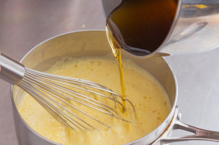 Add syrup to custard Add syrup to custard