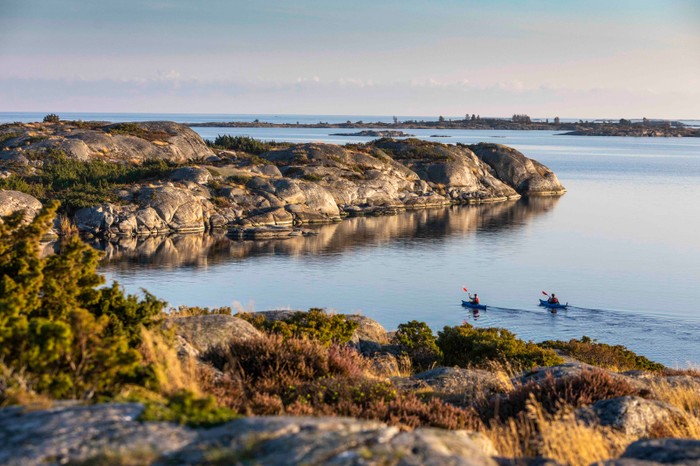 Stockholm Archipelago Two kayaks in the water by Stockholm's archipelago islands