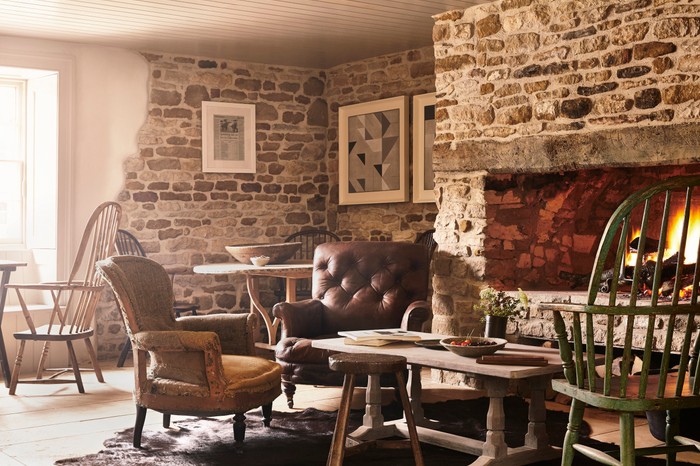 Pub area at The Wild Rabbit, Kingham A roaring fire and squidgy leather chairs in the pub area of the Wild Rabbit, Kingham