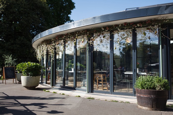 Pear Tree Café Battersea The round glass building home to Pear Tree Cafe sits next to the river in Battersea park