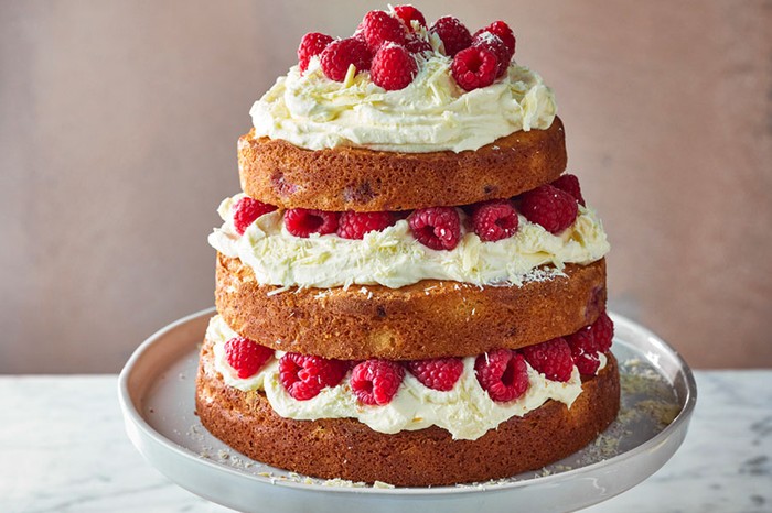 White chocolate and raspberry cake Layered sponge cake with white chocolate and raspberries