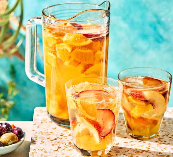 white wine sangria White sangria in pitcher and glasses